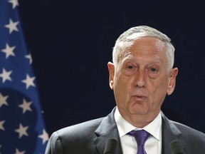 U.S Defense Secretary Jim Mattis speaks during a joint press conference with his French counterpart Florence Parly in Paris, Turesday, Oct.2, 2018.