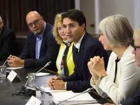 Prime Minister Justin Trudeau participates in a roundtable with Canada's Building Trades Unions on Parliament Hill in Ottawa on Monday, Oct. 15, 2018.