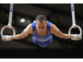 Ukraine's Oleg Verniaiev performs on the rings during the Men's All-Around Final of the Gymnastics World Chamionships at the Aspire Dome in Doha, Qatar, Wednesday, Oct. 31, 2018.