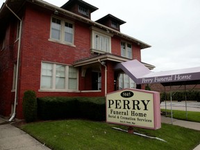The Perry Funeral Home on Trumbull Aveenue in Detroit is pictured on October 21, 2018. - It is reported that 63 remains of fetuses were removed from Perry Funeral Home, 36 stored in boxes and another 27 found in freezers, police said. Detroit Police Chief James Craig has announced a "wide probe" into Michigan funeral homes.