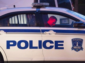 Halifax Regional Police attend a crime scene in Halifax on May 17, 2016. A lawyer is calling for a judicial review after a complaint about the alleged misconduct of two Halifax police officers was investigated twice and dismissed both times.