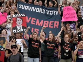 Hundreds of protesters occupy the centre steps of the East Front of the U.S. Capitol after breaking through barricades to demonstrate against the confirmation of Supreme Court nominee Judge Brett Kavanaugh on Oct. 6, 2018, in Washington, D.C.