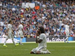 Real Madrid's Marcelo reacts after a missed opportunity during a Spanish La Liga soccer match between Real Madrid and Levante at the Santiago Bernabeu stadium in Madrid, Spain, Saturday, Oct. 20, 2018.
