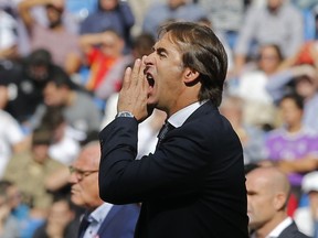 Real Madrid's coach Julen Lopetegui shouts instructions to his players,  during a Spanish La Liga soccer match between Real Madrid and Levante at the Santiago Bernabeu stadium in Madrid, Spain, Saturday, Oct. 20, 2018.