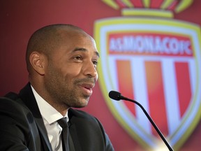 New AS Monaco head coach Thierry Henry answers questions during his official media presentation at the Monaco Yacht Club, Wednesday, Oct. 17, 2018. France's all-time leading scorer and an Arsenal great landed his first managerial job on Saturday after Monaco hired him as a replacement for Leonardo Jardim, who was dismissed this week.