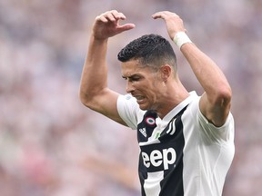FILE - In this Saturday, Aug. 25, 2018 Juventus' Cristiano Ronaldo reacts during the Serie A soccer match between Juventus and Lazio at the Allianz Stadium in Turin, Italy. Lawyers for a Nevada woman who has accused Cristiano Ronaldo of raping her say a psychiatrist determined she suffers post-traumatic stress and depression because of the alleged 2009 attack in Las Vegas. Kathryn Mayorga's attorney, Leslie Stovall, told reporters Wednesday that the psychiatrist's medical opinion is that Mayorga's psychological injuries made her "incompetent" to legally reach a non-disclosure settlement with Ronaldo's representatives in 2010.