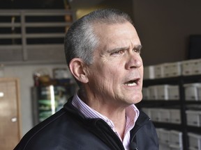 In this Oct. 6, 2018 photo Republican State Auditor Matt Rosendale discusses his campaign to defeat Montana Democratic U.S. Sen. Jon Tester at a campaign event at Lonewolf Energy in Billings, Mont. Rosendale trails in fundraising but he's stayed competitive with $14 million spent by deep-pocketed conservative groups on his behalf.