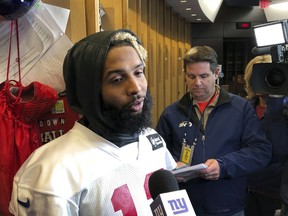 New York Giants wide receiver Odell Beckham Jr., speaks with reporters inside the NFL football team's locker room, Friday, Oct. 19, 2018, in East Rutherford, N.J. The Giants face the Atlanta Falcons on Monday night in Atlanta.