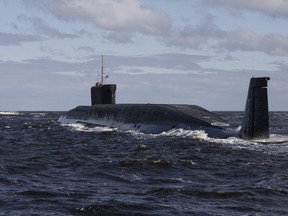 in this file photo taken on Thursday, July 2, 2009,  the Russian nuclear submarine, Yuri Dolgoruky, is seen during sea trials near Arkhangelsk, Russia.