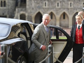 Britain's Prince Charles arrives ahead of the wedding of Princess Eugenie of York and Jack Brooksbank at St George's Chapel, Windsor Castle, near London, England, Friday Oct. 12, 2018.