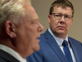 Premier of Ontario Doug Ford, left, and Premier of Saskatchewan Scott Moe during a media event in Saskatoon, Thursday, October 4, 2018.