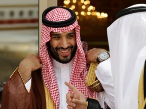 FILE - In this May 14, 2012 file photo, Prince Mohammed bin Salman speaks with a Saudi prince in Riyadh, Saudi Arabia. The disappearance of Saudi journalist and contributor to The Washington Post Jamal Khashoggi on Oct. 2, 2018, in Turkey peels away a carefully cultivated reformist veneer promoted about the Saudi Crown Prince, instead exposing its autocratic tendencies. The kingdom long has been known to grab rambunctious princes or opponents abroad and spirit them back to Riyadh on private planes. But the disappearance of Khashoggi, who Turkish officials fear has been killed, potentially has taken the practice to a new, macabre level by grabbing a writer who could both navigate Saudi Arabia's byzantine royal court and explain it to the West.