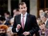 Treasury Board President Scott Brison speaks during question period in the House of Commons on Oct. 16, 2018.