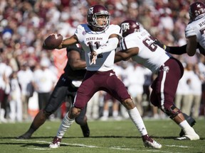 Texas A&M quarterback Kellen Mond (11) attempts a pass during the first half of an NCAA college football game against South Carolina Saturday, Oct. 13, 2018, in Columbia, S.C.