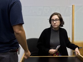 American Lara Alqasem sits in a courtroom prior to a hearing at the district court in Tel Aviv, Israel, Thursday, Oct. 11, 2018. A senior Israeli cabinet minister on Wednesday defended the government's handling of the case of an American graduate student held in detention at the country's international airport for the past week over allegations that she promotes a boycott against the Jewish state.