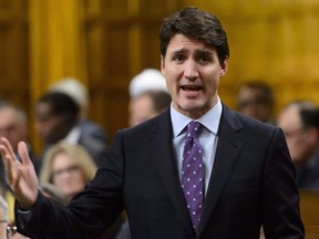 Prime Minister Justin Trudeau stands during question period in the House of Commons on Parliament Hill in Ottawa on Monday, Oct. 22, 2018.