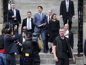Prime Minister Justin Trudeau and Minister of Foreign Affairs Chrystia Freeland make their way to hold a press conference regarding the United States Mexico Canada Agreement (USMCA) at the National Press Theatre, in Ottawa on Monday, Oct. 1, 2018.