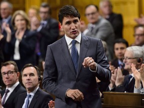 Prime Minister Justin Trudeau stands during question period in the House of Commons on Parliament Hill in Ottawa on Monday, Oct. 1, 2018.