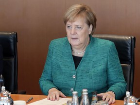 German Chancellor Angela Merkel attends the weekly cabinet meeting at the chancellery in Berlin, Germany, Tuesday, Oct. 2, 2018.