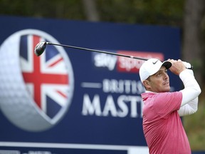 Italy's Francesco Molinari plays a shot on during day two of the British Masters at Walton Heath Golf Club, Surrey, Enland, Friday Oct. 12, 2018.