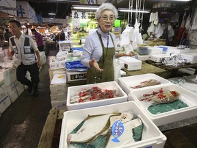 In this Sept. 26, 2018, photo, Tai Yamaguchi of fish wholesaler Hitoku Shoten, speaks during an interview with the Associated Press at Tsukiji fish market in Tokyo. Japan's famed Tsukiji fish market is closing down on Saturday, Oct. 6, 2018 after eight decades, with shop owners and workers still doubting the safety of its replacement site. "If the new place were better, I'll be happy to move," said Yamaguchi. Yamaguchi feels it has been mishandled by authorities who failed to fully consult those affected.