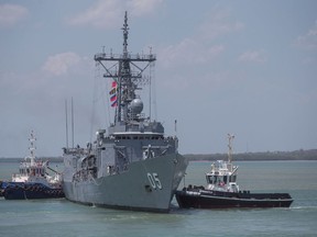 In this Sept. 13, 2018, file photo, guided missile frigate HMAS Melbourne leads the fleet back to harbour following Exercise KAKADU, Australia's largest maritime exercise, in Darwin, Northern Territory. Australia has assigned the guided missile frigate to the East China Sea to boast international efforts to enforce sanctions against North Korea, an Australian officer said on Friday, Oct. 12.