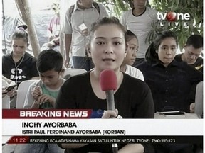In this image from video, Inchy Ayorbaba, wife of missing passenger Paul Ferdinand Ayorbaba, speaks in a TV interview in Jakarta on Wednesday, Oct. 31, 2018. Indonesian TV broadcast a smartphone video by Paul Ferdinand Ayorbaba of passengers boarding Flight 610 on Oct. 29, its mundane details transformed into unsettling moments by knowledge of the tragedy that would transpire. "My husband sent that video to me via WhatsApp. It was his last contact with me, his last message to me," Inchy Ayorbaba said. (TV One via AP)