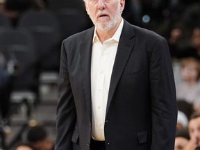 San Antonio Spurs head coach Gregg Popovich watches the second half of an NBA preseason basketball game against the Houston Rockets, Sunday, Oct. 7, 2018, in San Antonio.