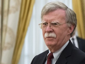In this Wednesday, June 27, 2018 file photo, U.S. National security adviser John Bolton waits for the talks with Russian President Vladimir Putin in the Kremlin in Moscow, Russia.