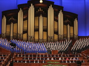 FILE - In this March 31, 2018, file photo, The Mormon Tabernacle Choir perform during the twice-annual conference of The Church of Jesus Christ of Latter-day Saints, in Salt Lake City. The well-known Mormon Tabernacle Choir was renamed Friday, Oct. 5, 2018, to strip out the word Mormon in a move showing the faith's new president is serious about ending shorthand names for the religion that have been used for generations by church members and previously promoted by the church. The gospel singing group will now be called "The Tabernacle Choir at Temple Square," The Church of Jesus Christ of Latter-day Saints said in a statement.