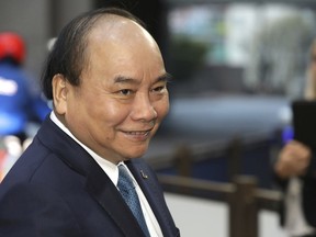 Vietnam's Prime Minister Nguyen Xuan Phuc arrives for an EU-ASEM summit in Brussels, Friday, Oct. 19, 2018. EU leaders meet with their Asian counterparts Friday to discuss trade, among other issues.