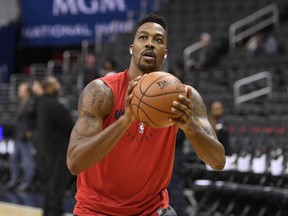 Washington Wizards center Dwight Howard shoots around before an NBA basketball game against the Miami Heat, Thursday, Oct. 18, 2018, in Washington.