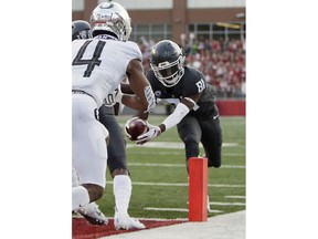 Washington State wide receiver Renard Bell (81) runs for a touchdown against Oregon during the first half of an NCAA college football game in Pullman, Wash., Saturday, Oct. 20, 2018.
