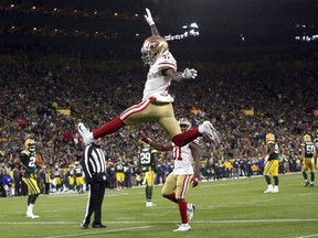San Francisco 49ers wide receiver Marquise Goodwin (11) celebrates a touchdown during the first half of an NFL football game against the Green Bay Packers Monday, Oct. 15, 2018, in Green Bay, Wis.