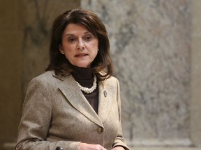 FILE - In this Nov. 7, 2017, file photo, Wisconsin state Sen. Leah Vukmir stands in the Senate chambers at the state Capitol in Madison. Republican U.S. Senate candidate Vukmir told Democratic Sen. Tammy Baldwin on Wednesday, Oct. 3, 2018, that "your lies are spiraling," as Baldwin and Democrats unleashed more attacks on Vukmir's record with the election less than five weeks away.