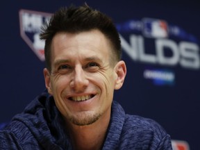 Milwaukee Brewers manager Craig Counsell answers questions during a news conference for the National League Divisional Series baseball game Wednesday, Oct. 3, 2018, in Milwaukee.