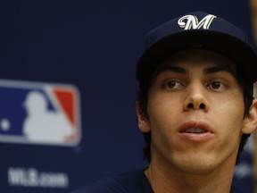 Milwaukee Brewers' Christian Yelich answers questions before Game 1 of the National League Championship Series baseball game Thursday, Oct. 11, 2018, in Milwaukee. The Brewers play the Los Angeles Dodgers on Friday, Oct. 12, 2018.