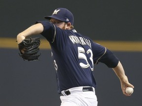 Milwaukee Brewers starting pitcher Brandon Woodruff throws during the first inning of Game 1 of the National League Divisional Series baseball game against the Colorado Rockies Thursday, Oct. 4, 2018, in Milwaukee.