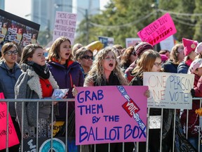 Women gather for a rally and march at Grant Park on October 13, 2018 in Chicago, Illinois to inspire voter turnout ahead of midterm polls in the United States. - Women angered by the bitter fight over a US Supreme Court nominee and what they called the "anti-woman agenda" of the Trump administration headed into the streets of Chicago on Saturday in a display of political might.