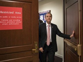 FILE - In this March 22, 2018 file photo, Rep. Adam Schiff, D-Calif., ranking member of the House Intelligence Committee, exits a secure area to speak to reporters, on Capitol Hill in Washington.  House Democrats are expected to re-open the investigation into Russian interference in the 2016 election if they win the majority in the November midterms, but they would have to be selective in what they investigate.