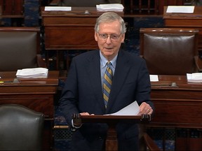 In this image from Senate Television, Senate Majority Leader Mitch McConnell of Ky., speaks on the floor of the U.S. Senate, Monday, Oct. 1, 2018, on Capitol Hill in Washington. (Senate Television via AP)