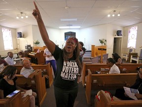 In this Aug. 22, 2018, photo Black Voters Matter co-founder LaTosha Brown speaks at a church as part of The South Rising Tour 2018 in Warner Robins, Ga. The tour was reaching out to black and woman voters in rural Georgia, Florida and Mississippi. The Black Belt's overlap with Trump Country could factor into the elections across the South next month, including competitive races for the governor's mansion in Florida and Senate in Mississippi.