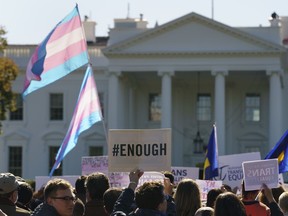 The National Center for Transgender Equality, NCTE, and the Human Rights Campaign gather on Pennsylvania Avenue in front of the White House in Washington, Monday, Oct. 22, 2018, for a #WontBeErased rally. Anatomy at birth may prompt a check in the "male" or "female" box on the birth certificate _ but to doctors and scientists, sex and gender aren't always the same thing. The Trump administration purportedly is considering defining gender as determined by sex organs at birth, which if adopted could deny certain civil rights protections to an estimated 1.4 million transgender Americans.