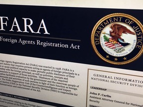 FILE - In this Aug. 18, 2016, file photo, a portion of the website for the website fara.gov, on the Foreign Agents Registration Act, is seen photographed in Washington. A push to give the Justice Department more enforcement authority over the lucrative and at times shadowy world of foreign lobbying is stalled amid opposition from pro-business groups, nonprofits and privacy advocates.