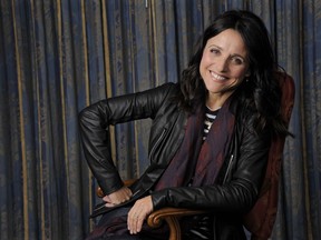 FILE - In this Sept. 8, 2013 file photo, Julia Louis-Dreyfus poses for a portrait at the 2013 Toronto International Film Festival in Toronto. One of the best-known comedic actresses of her generation, Julia Louis-Dreyfus, is receiving the Mark Twain Award for lifetime achievement in comedy. Louis-Dreyfus will receive the 21st Twain prize Sunday night at Washington's Kennedy Center, with testimonials from Jerry Seinfeld, Stephen Colbert and 2010 Mark Twain recipient Tina Fey.