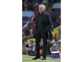 ManU coach Jose Mourinho shouts from the touchline during the Champions League group H soccer match between Manchester United and Valencia at Old Trafford Stadium in Manchester, England, Tuesday Oct. 2, 2018.