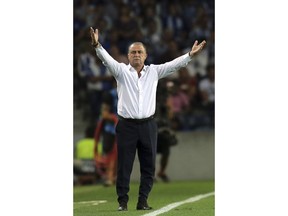 Galatasaray coach Fatih Terim gestures during the Champions League group D soccer match between FC Porto and Galatasaray at the Dragao stadium in Porto, Portugal, Wednesday, Oct. 3, 2018.