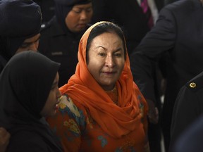 Rosmah Mansor, wife of former Malaysian Prime Minister Najib Razak arrives at Kuala Lumpur High Court in Kuala Lumpur, Malaysia, Thursday, Oct. 4, 2018. Rosmah was arrested by the anti graft agency Wednesday and will face money laundering charges related to a graft scandal in the 1mdb state investment fund.