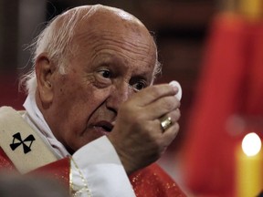 FILE - In this May 18, 2018 file photo, the archbishop of Santiago, Ricardo Ezzati, gives his first mass after returning from the Vatican, in Santiago. Chile's Catholic church is apologizing for a set of guidelines published on Friday, Sept. 28, that have caused outrage just as the South American country is being rocked by a widespread clerical sex abuse scandal.