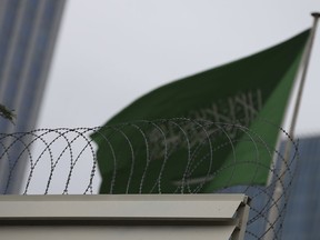 The Saudi Arabia flag flies over the consulate in Istanbul, Thursday, Oct. 4, 2018. Saudi Arabia's Consulate in Istanbul insisted Thursday that Jamal Khashoggi, a missing Saudi contributor to The Washington Post, left its building before disappearing, directly contradicting Turkish officials who say they believe the writer is still inside.